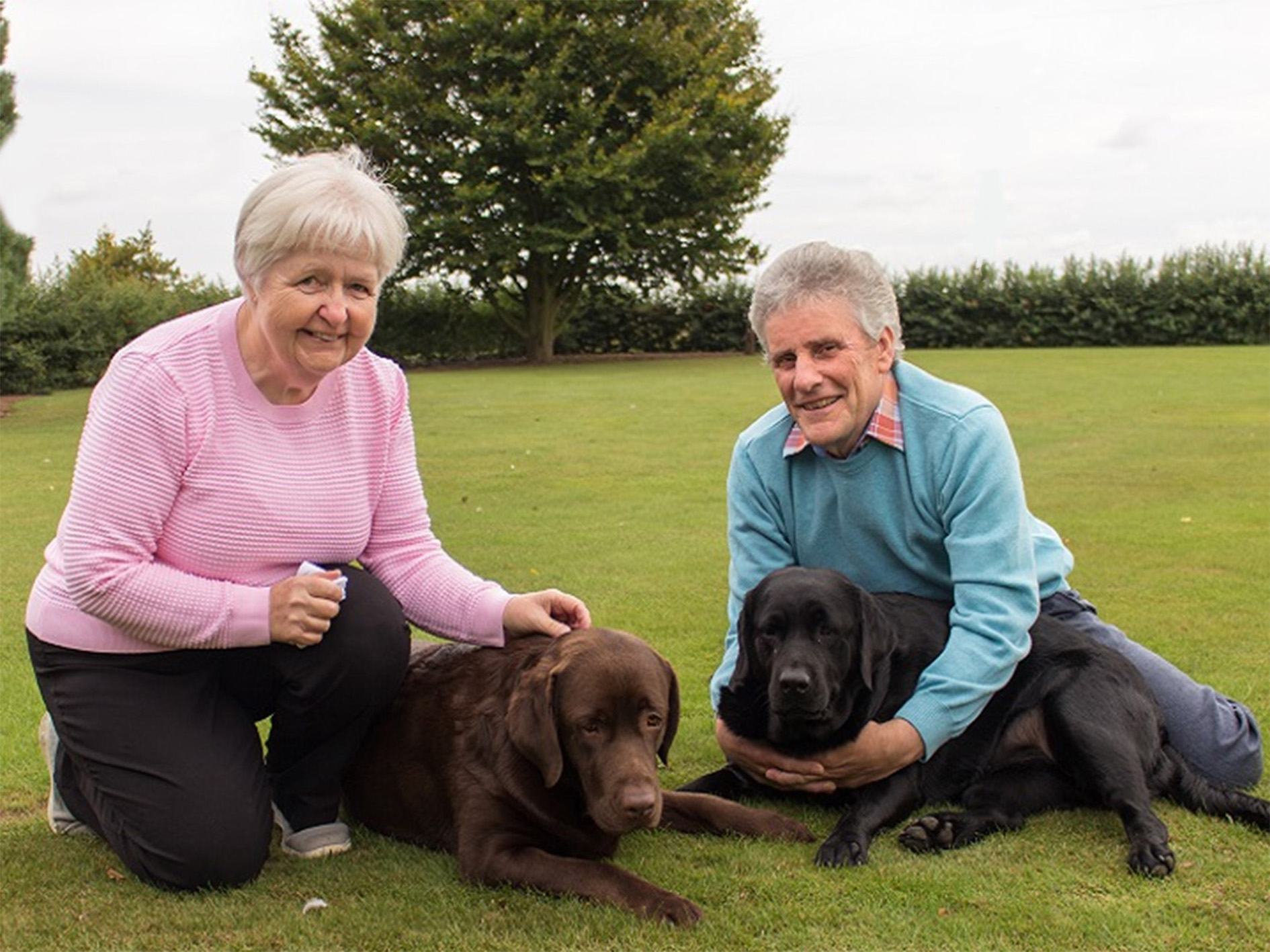 Colin and Lisa King with their Labradors, Crumble and Pie, in Woodhall Spa.